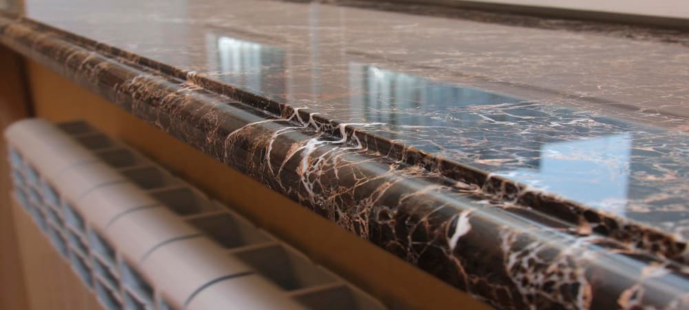 На фото - Подоконники из акрилового камня от компании «Acrylic-stone» Подоконник из искусственного камня