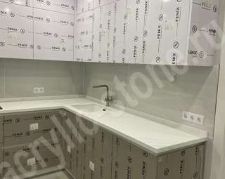 Фото Угловая столешница  из искусственного камня Grandex с мойкой керамической