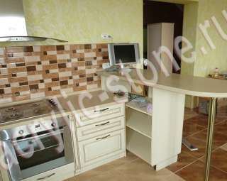 Фото Столешница для кухни из акрилового камня с плавным бортом